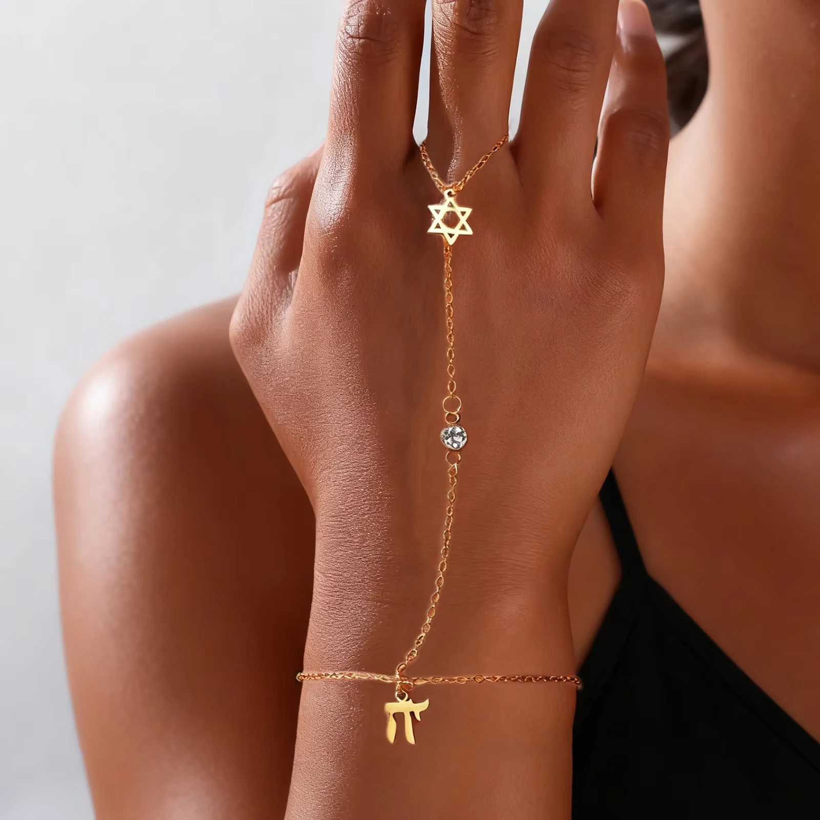 Jewelry & Watches Spółka Z Ograniczoną Odpowiedzialnością Sp Z Oo - سوار إصبع نجمة داود اليهودية بحرف
